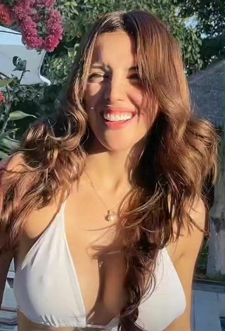 3. Cute Rosángela Espinoza Shows Cleavage in White Bikini Top