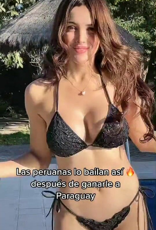 2. Beautiful Rosángela Espinoza Shows Cleavage in Sexy Black Bikini at the Pool