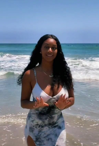 Sexy Sharan Jones Shows Cleavage in Sundress at the Beach Braless and Bouncing Boobs