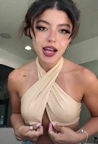 2. Sexy Sabrina Quesada in Beige Crop Top