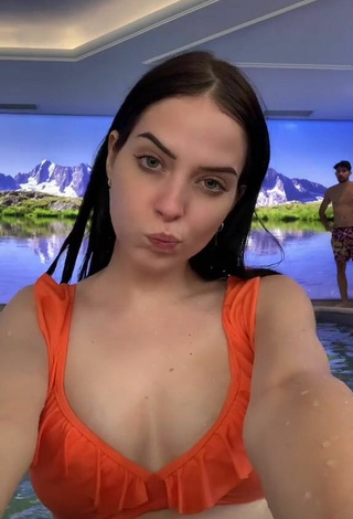 Sexy Sara Shows Cleavage in Orange Bikini Top at the Swimming Pool