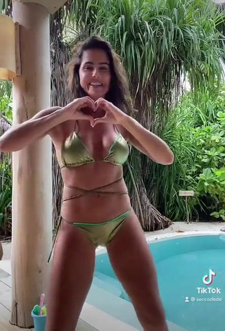 5. Sexy Deborah Secco Shows Cleavage in Green Bikini at the Swimming Pool