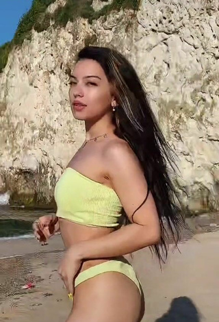 Cute Sivara Jidkova in Yellow Bikini at the Beach