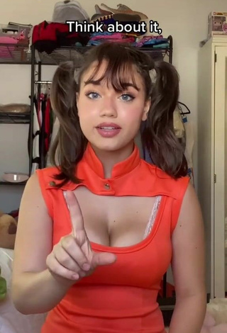 Cute Sofia Gomez Shows Cleavage in Orange Dress and Bouncing Boobs