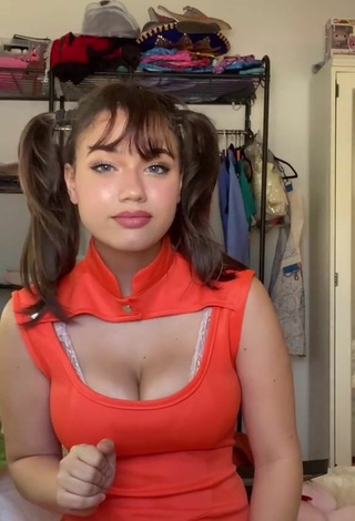 3. Cute Sofia Gomez Shows Cleavage in Orange Dress and Bouncing Boobs