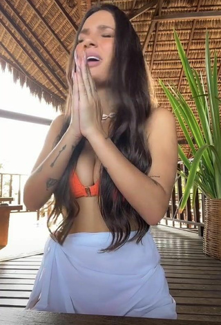 2. Sexy Stéfani Bays Shows Cleavage in Orange Bikini Top