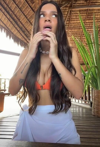 5. Sexy Stéfani Bays Shows Cleavage in Orange Bikini Top