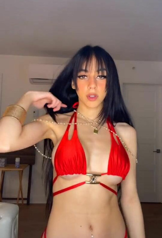 2. Sexy Christina Kalamvokis Shows Cleavage in Red Bikini