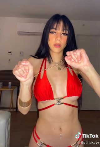 3. Sexy Christina Kalamvokis Shows Cleavage in Red Bikini