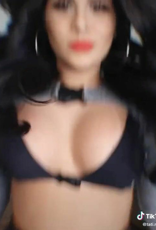4. Erotic Tati Nunes Shows Cleavage in Black Bikini Top