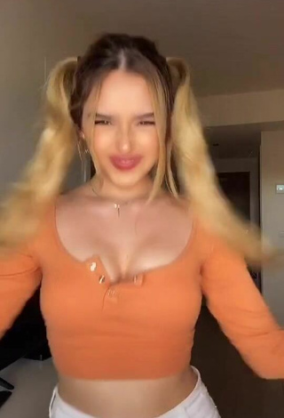 Teressa Dillon Shows Cleavage in Alluring Orange Crop Top and Bouncing Tits