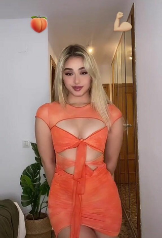 Sweetie Teressa Dillon Shows Cleavage in Orange Dress