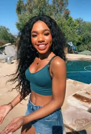 2. Amazing Teala Dunn in Hot Turquoise Crop Top at the Pool