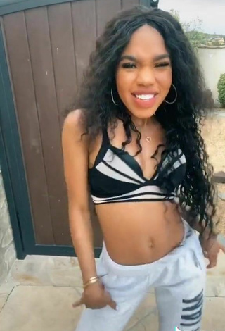 3. Sexy Teala Dunn Shows Cleavage in Sport Bra