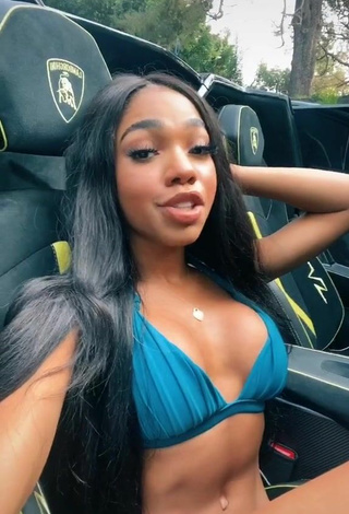 Hot Teala Dunn Shows Cleavage in Blue Bikini Top in a Car