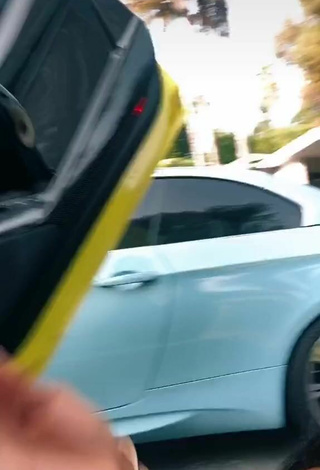5. Hot Teala Dunn Shows Cleavage in Blue Bikini Top in a Car