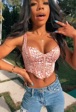 3. Beautiful Teala Dunn Shows Cleavage in Sexy Leopard Crop Top