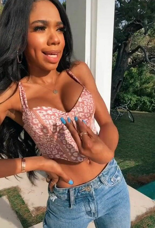 4. Beautiful Teala Dunn Shows Cleavage in Sexy Leopard Crop Top