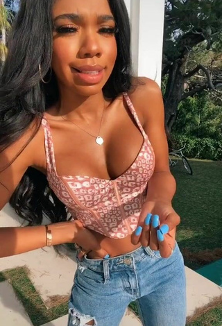 5. Beautiful Teala Dunn Shows Cleavage in Sexy Leopard Crop Top