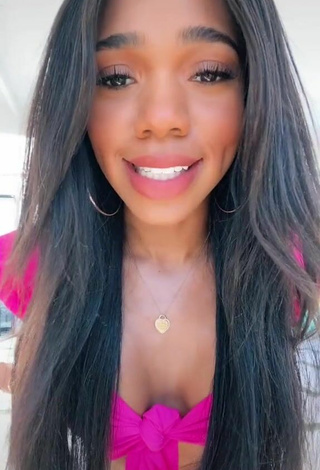 2. Hot Teala Dunn Shows Cleavage in Firefly Rose Crop Top