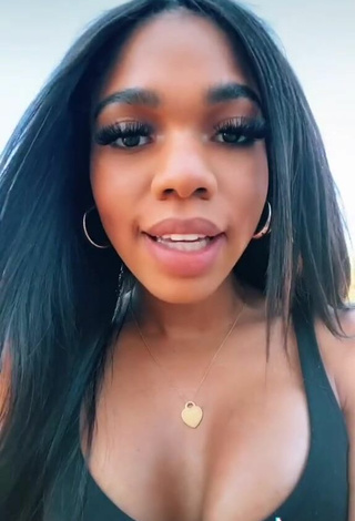 3. Sexy Teala Dunn Shows Cleavage in Black Top