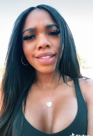 4. Sexy Teala Dunn Shows Cleavage in Black Top