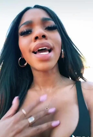 5. Sexy Teala Dunn Shows Cleavage in Black Top