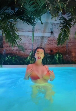 4. Sexy Valentina Gómez Shows Cleavage in Orange Bikini Top at the Pool