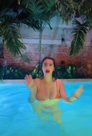 5. Sexy Valentina Gómez Shows Cleavage in Orange Bikini Top at the Pool