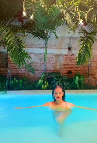 Sexy Valentina Gómez Shows Cleavage in Orange Bikini at the Swimming Pool