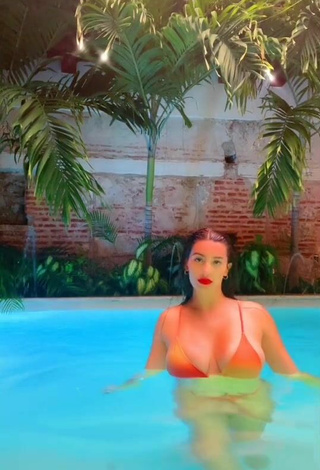 3. Sexy Valentina Gómez Shows Cleavage in Orange Bikini at the Swimming Pool