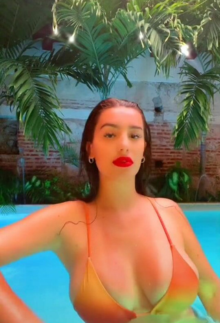 4. Sexy Valentina Gómez Shows Cleavage in Orange Bikini at the Swimming Pool