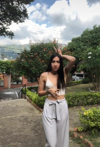 4. Sexy Val in White Crop Top