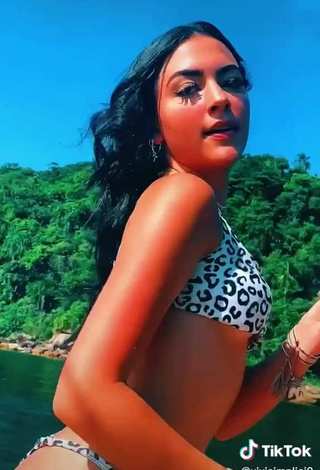 3. Hottie Vivi Shows Cleavage in Bikini on a Boat in the Sea