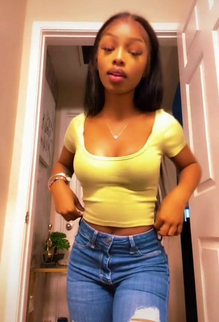 Sexy Shania Christian Shows Cleavage in Yellow Crop Top