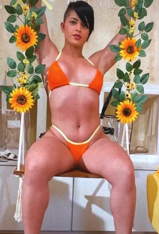 Yanne in Seductive Orange Bikini