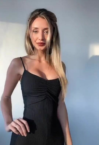 5. Sexy Giuliana Cagna Shows Cleavage in Black Overall
