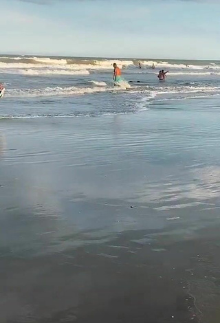 2. Beautiful Agos Nisi in Sexy Bikini Top at the Beach and Bouncing Boobs