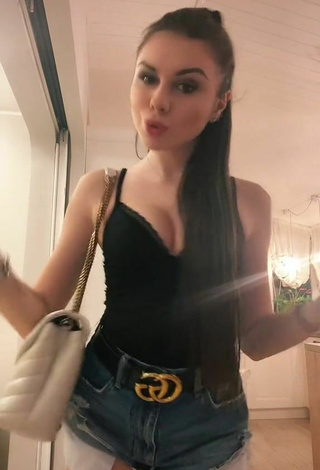 2. Sexy Aurora Celli Shows Cleavage in Black Top