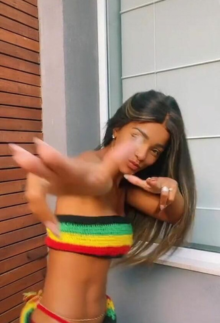 1. Hot Brunna Gonçalves in Striped Bikini Top