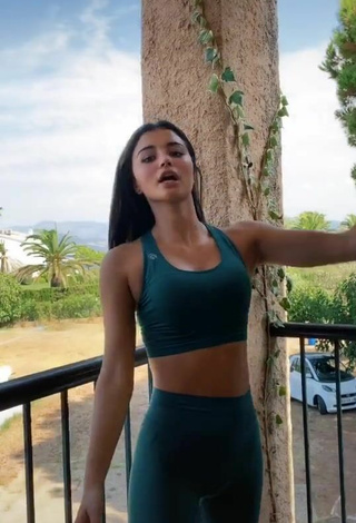 1. Sexy Cassandra Cano in Turquoise Leggings on the Balcony