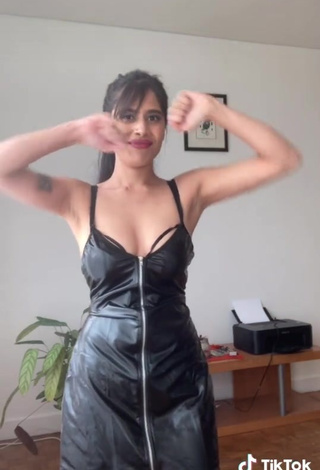Seductive XENA Shows Cleavage in Black Dress