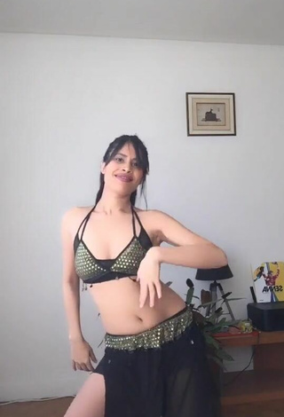 2. XENA Shows Cleavage in Alluring Crop Top