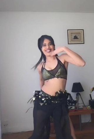 5. Attractive XENA Shows Cleavage in Crop Top
