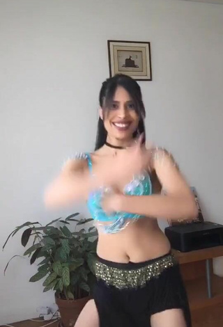 5. Gorgeous XENA in Alluring Blue Crop Top