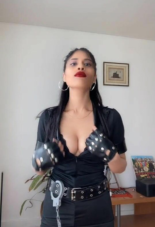 Erotic XENA Shows Cleavage in Black Dress