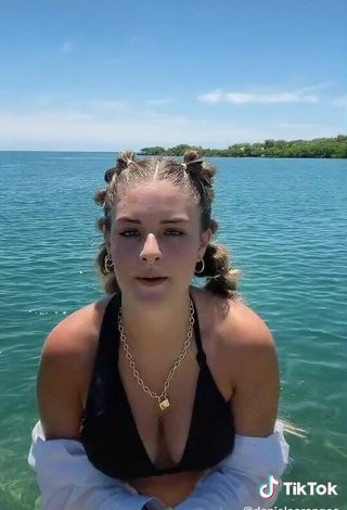 3. Sexy Daniela Arango Shows Cleavage in Black Bikini and Bouncing Tits in the Sea