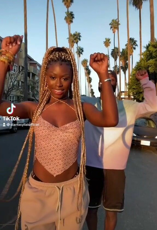 2. Hot Diarra Sylla Shows Cleavage in Crop Top in a Street