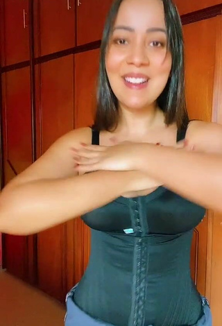 Sexy Dri Santos Shows Cleavage in Black Corset