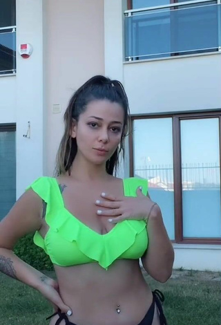 2. Sexy Duygu Aycan Shows Cleavage in Green Bikini Top